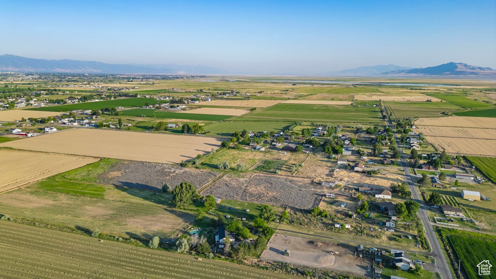 Drone / aerial view with a mountain view and a rural view