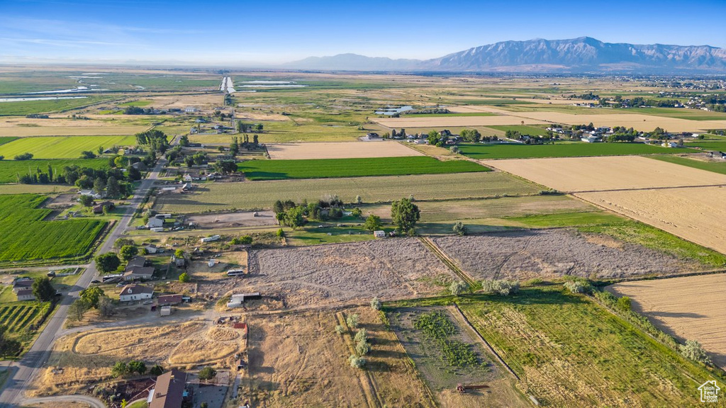 Birds eye view of property featuring a mountain view and a rural view