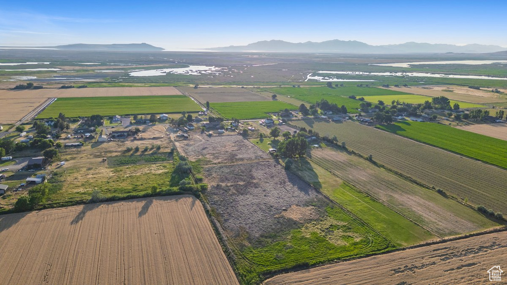 Birds eye view of property featuring a mountain view and a rural view