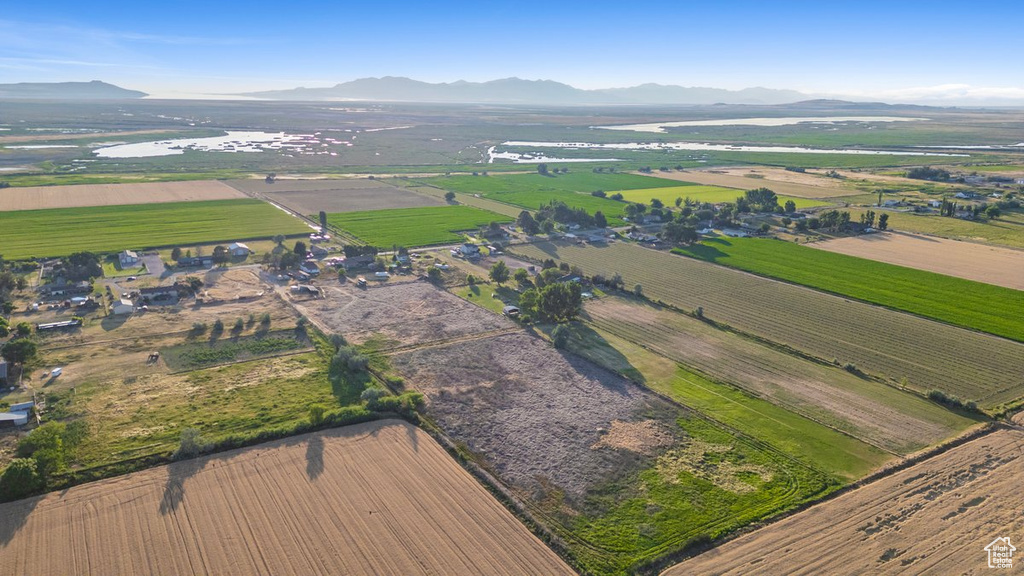 Birds eye view of property featuring a mountain view and a rural view