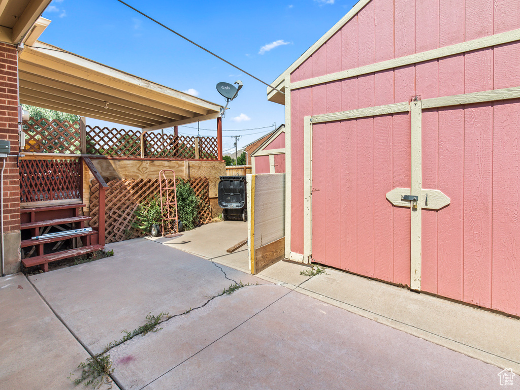 View of patio / terrace featuring an outbuilding