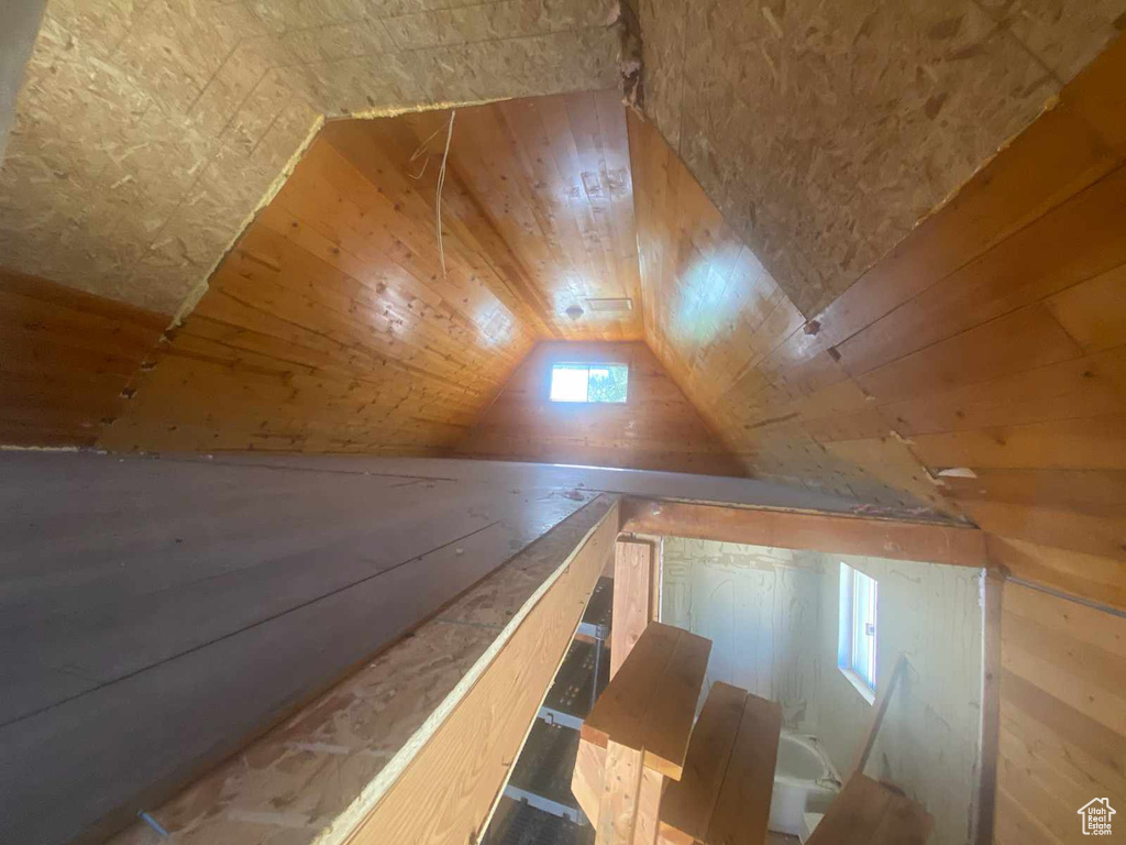 Additional living space featuring vaulted ceiling and wood ceiling