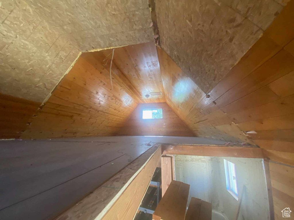 Bonus room with vaulted ceiling and wooden ceiling