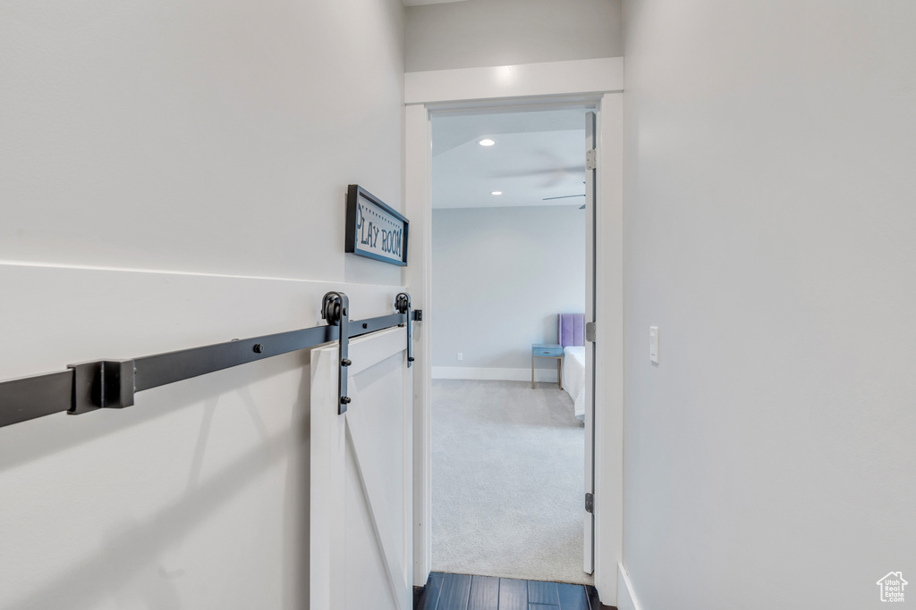 Hallway with carpet floors