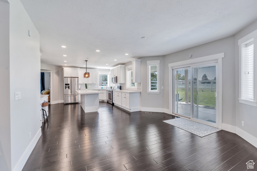 Living room featuring dark hardwood / wood-style floors