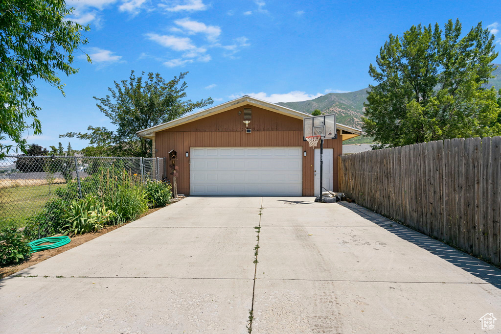 Garage featuring a mountain view