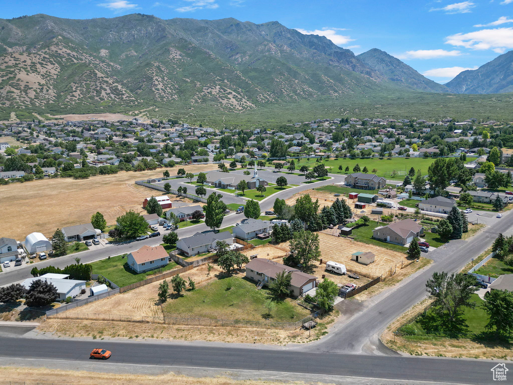 Birds eye view of property with a mountain view