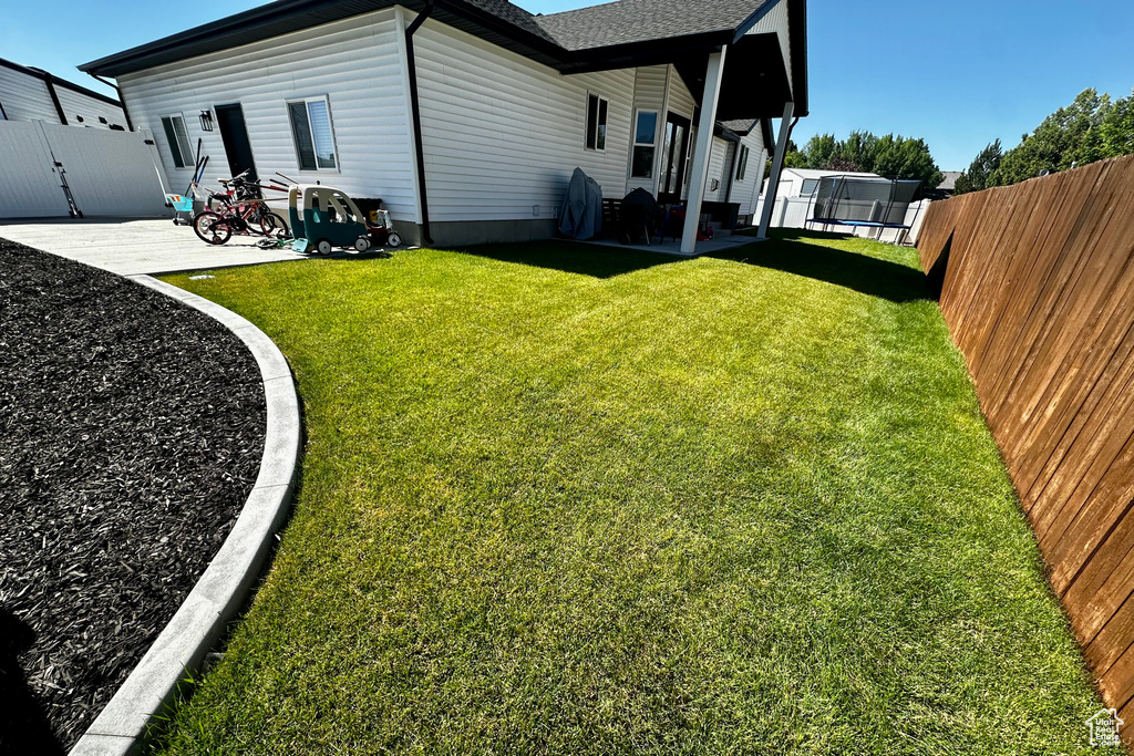 View of yard with a patio