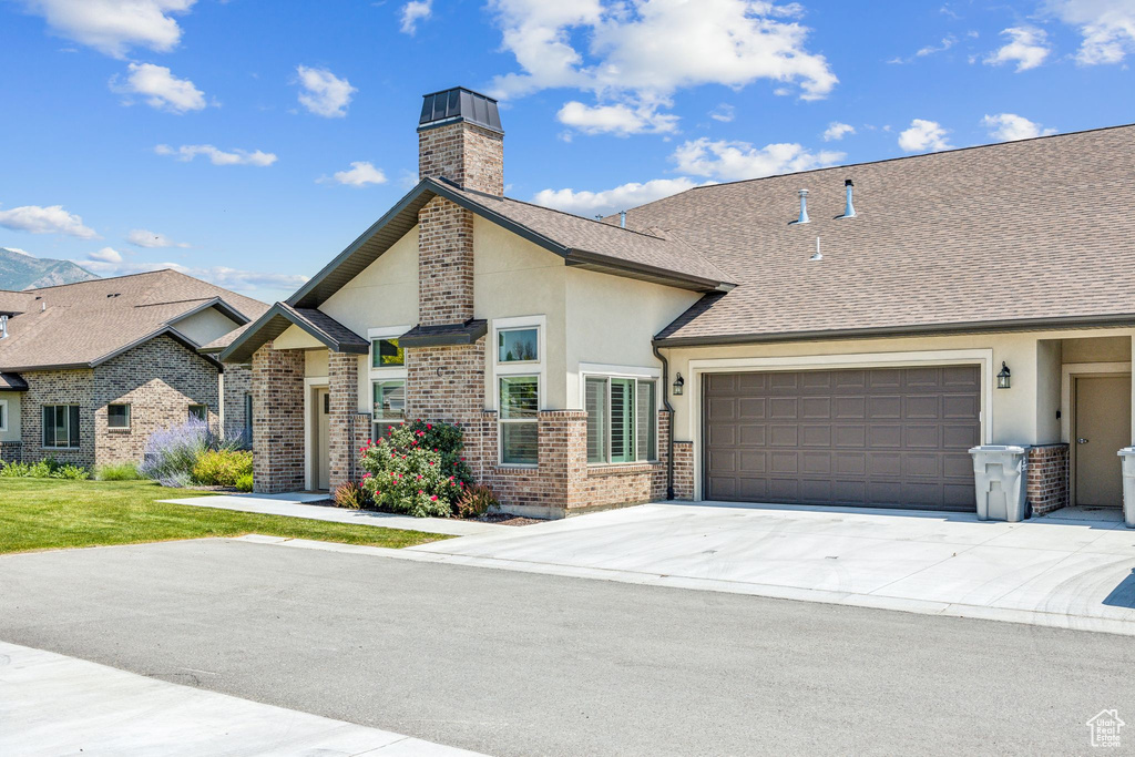 View of front facade with a garage