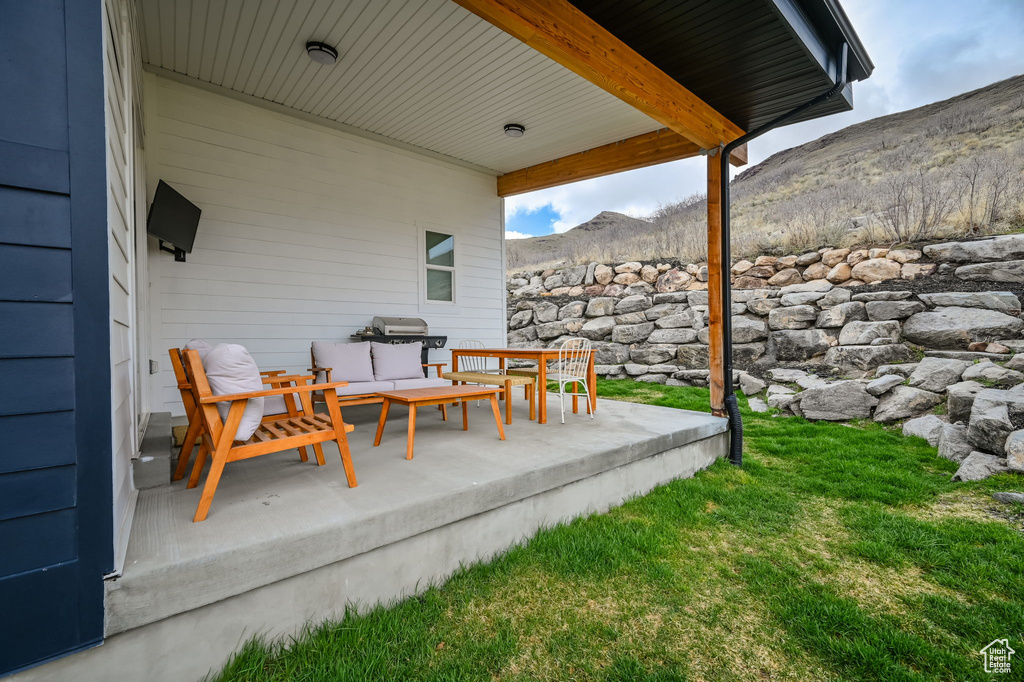 View of patio featuring a mountain view