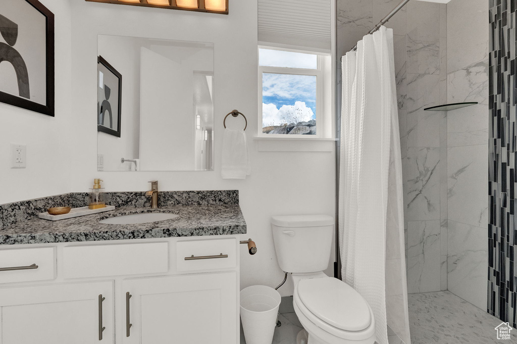 Bathroom with vanity and toilet