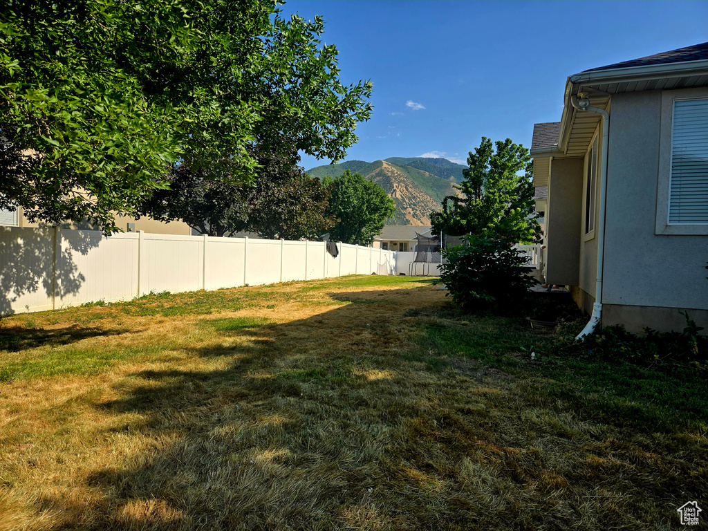 View of yard with a mountain view