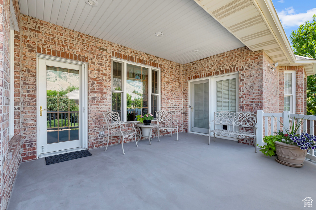 View of patio featuring a porch