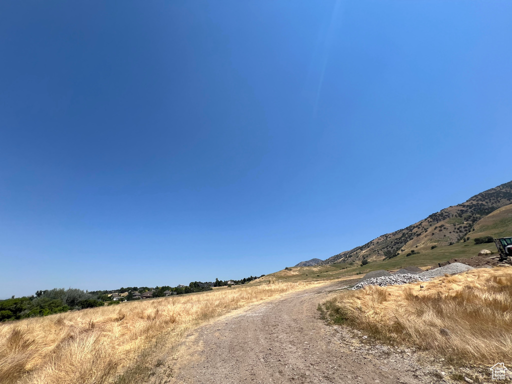 View of road with a mountain view and a rural view