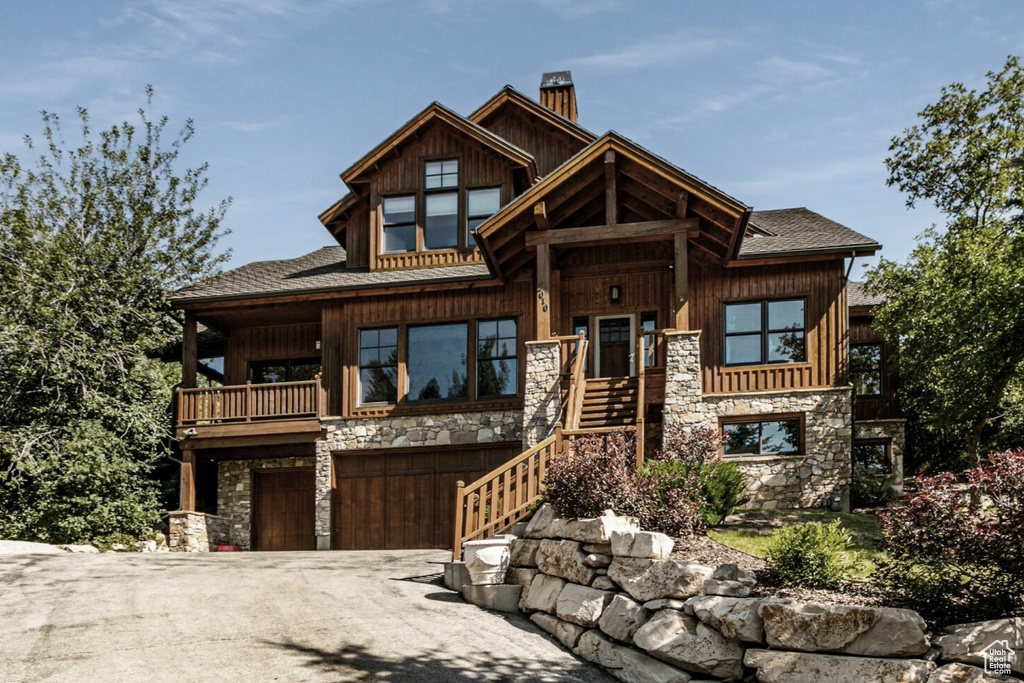 View of front of property with a garage