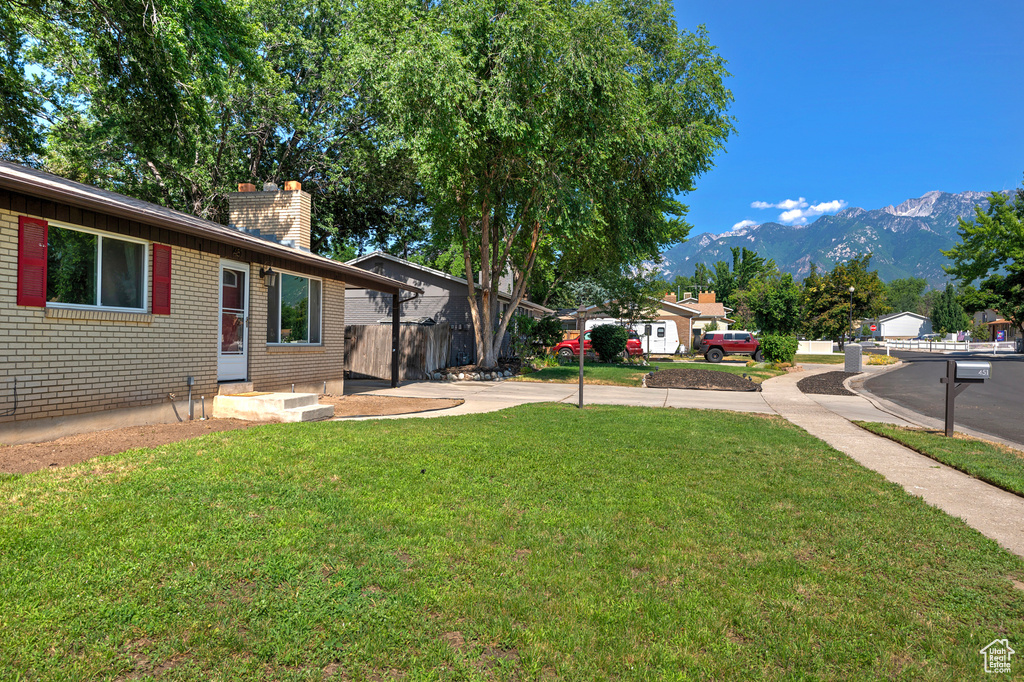 View of yard with a mountain view