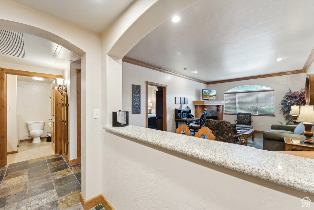 Corridor featuring tile patterned flooring