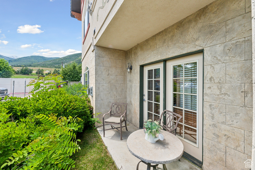 View of patio / terrace with a mountain view