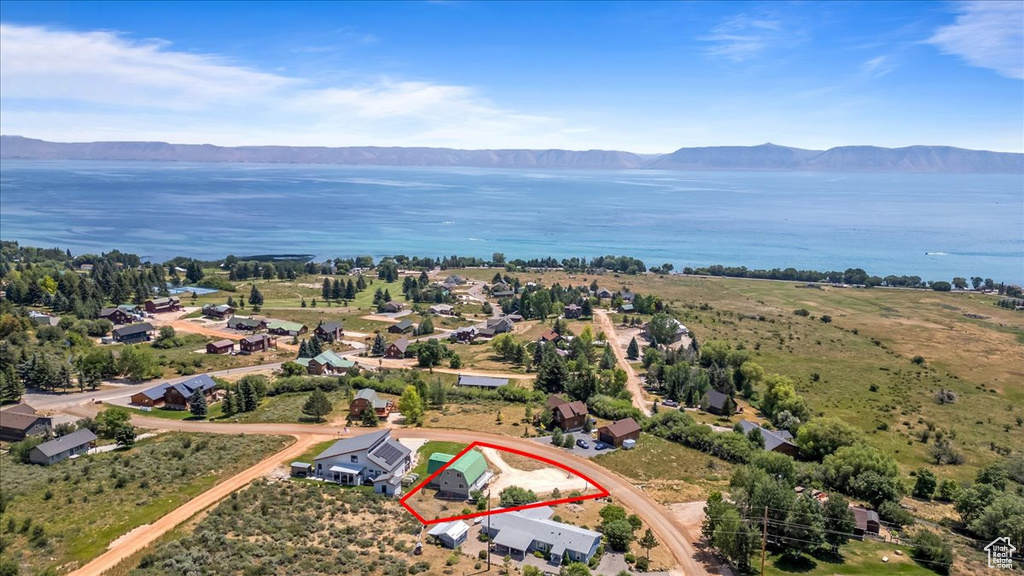 Aerial view with a water and mountain view