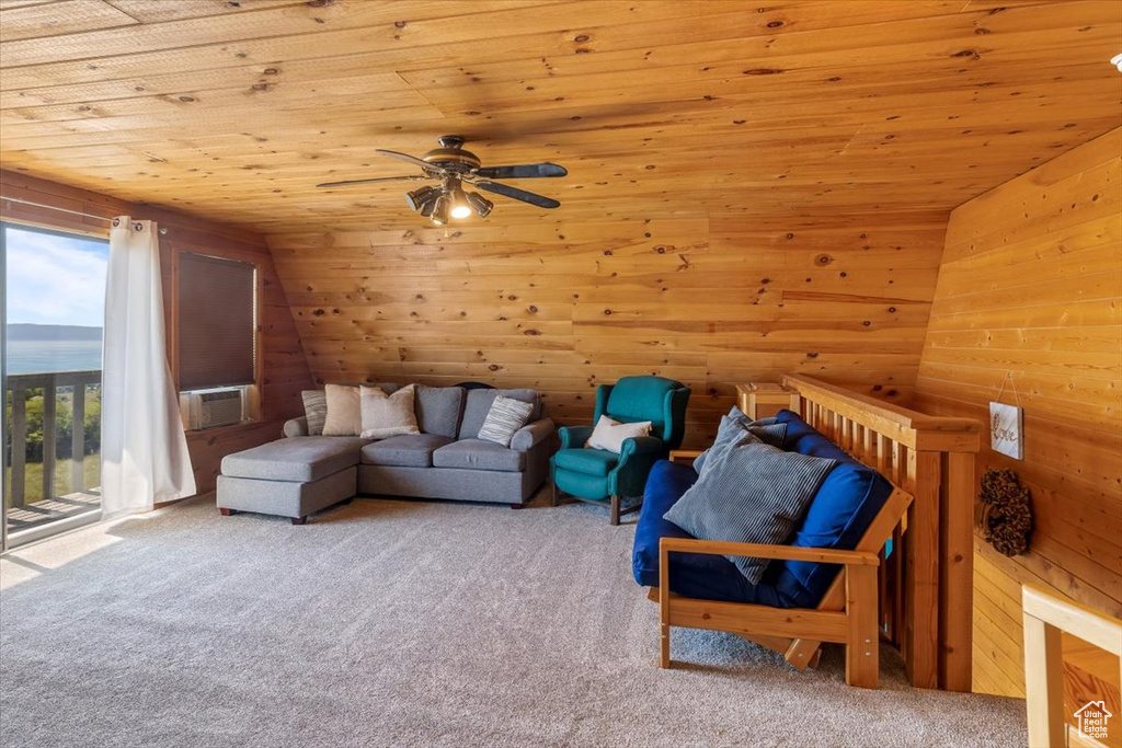 Carpeted living room featuring a water view, ceiling fan, wooden ceiling, vaulted ceiling, and cooling unit
