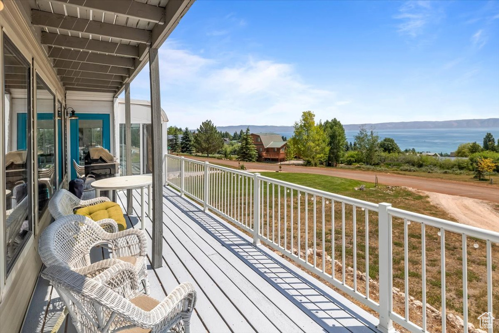 Deck featuring a water view