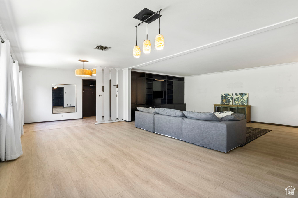 Unfurnished living room featuring light hardwood / wood-style flooring