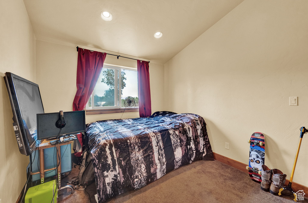 Bedroom featuring carpet floors