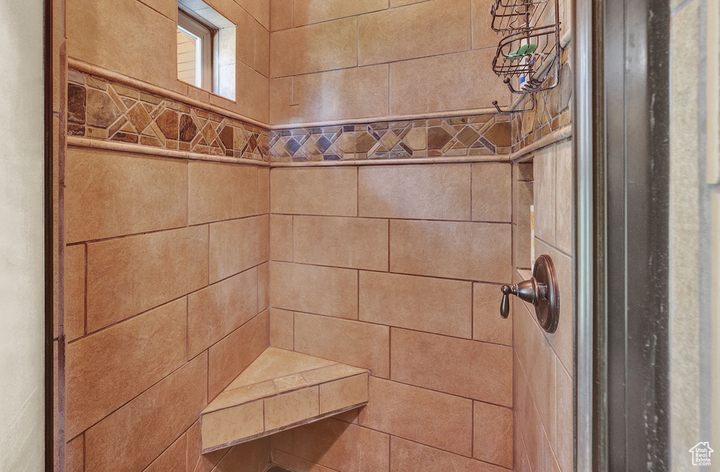 Bathroom with tiled shower