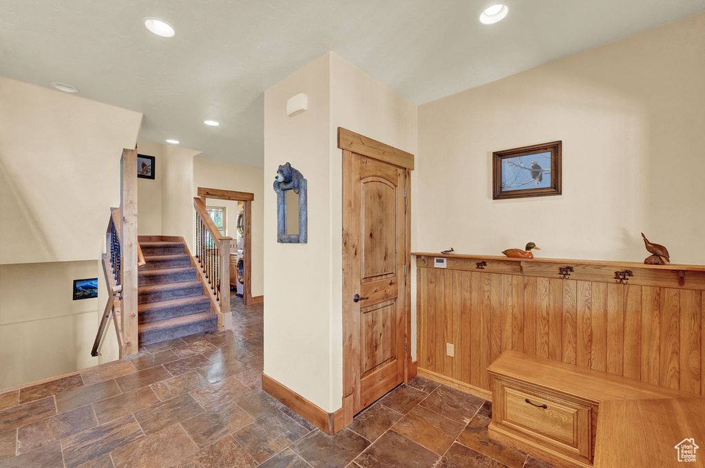 Interior space with dark tile patterned floors