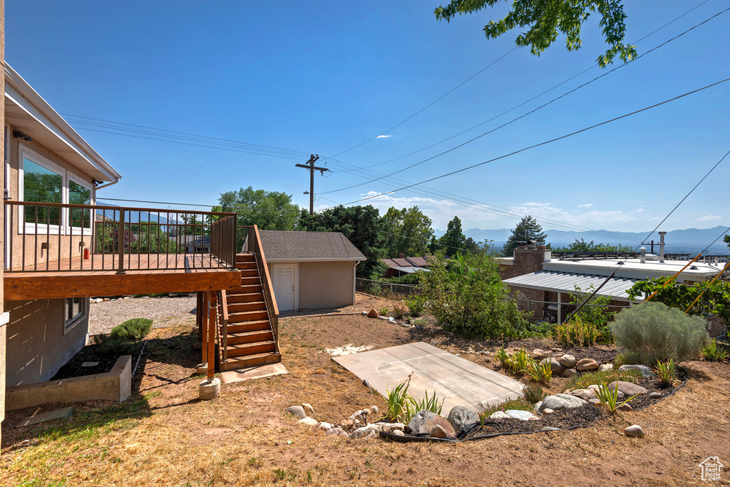 View of yard featuring a deck