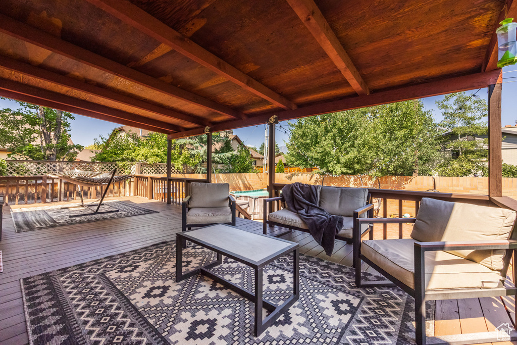 Wooden deck with an outdoor hangout area