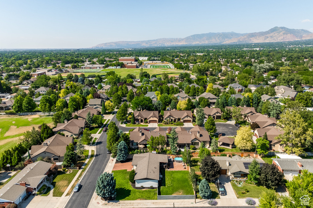 Birds eye view of property with a mountain view