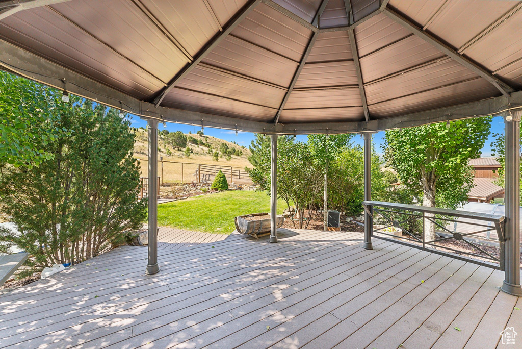 Deck featuring a gazebo