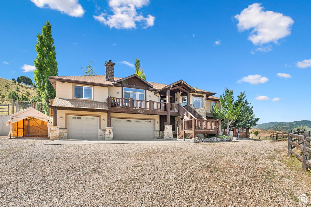 View of front of home with a garage