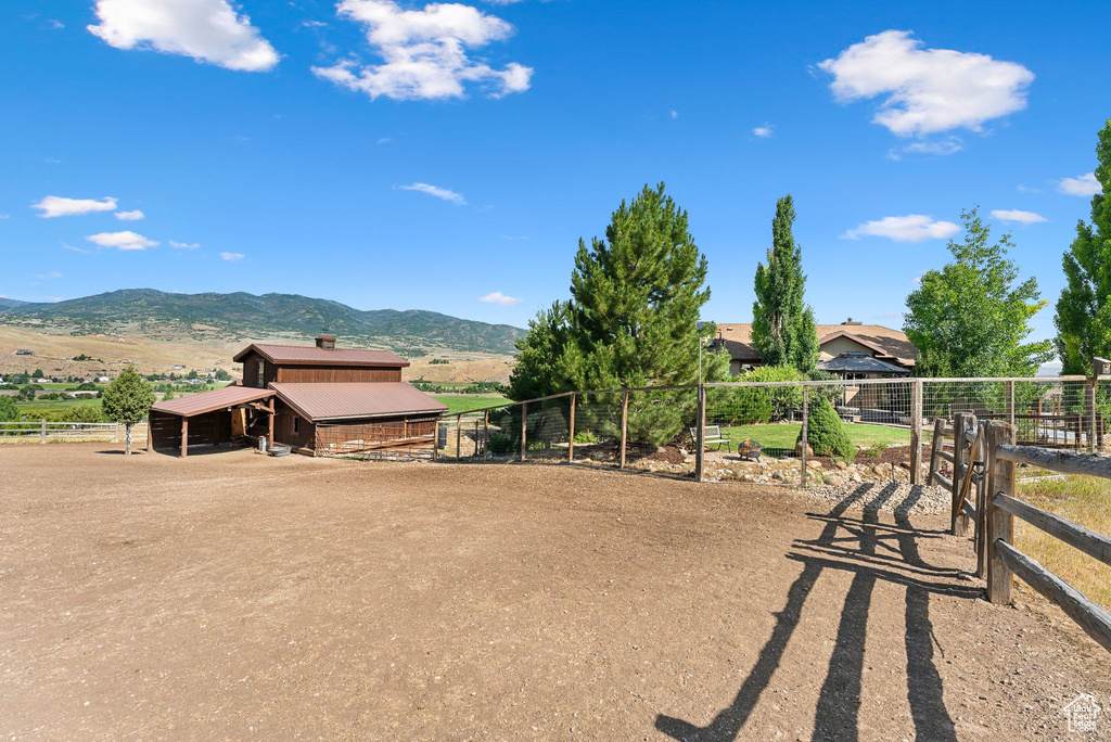 Exterior space with a mountain view and a rural view