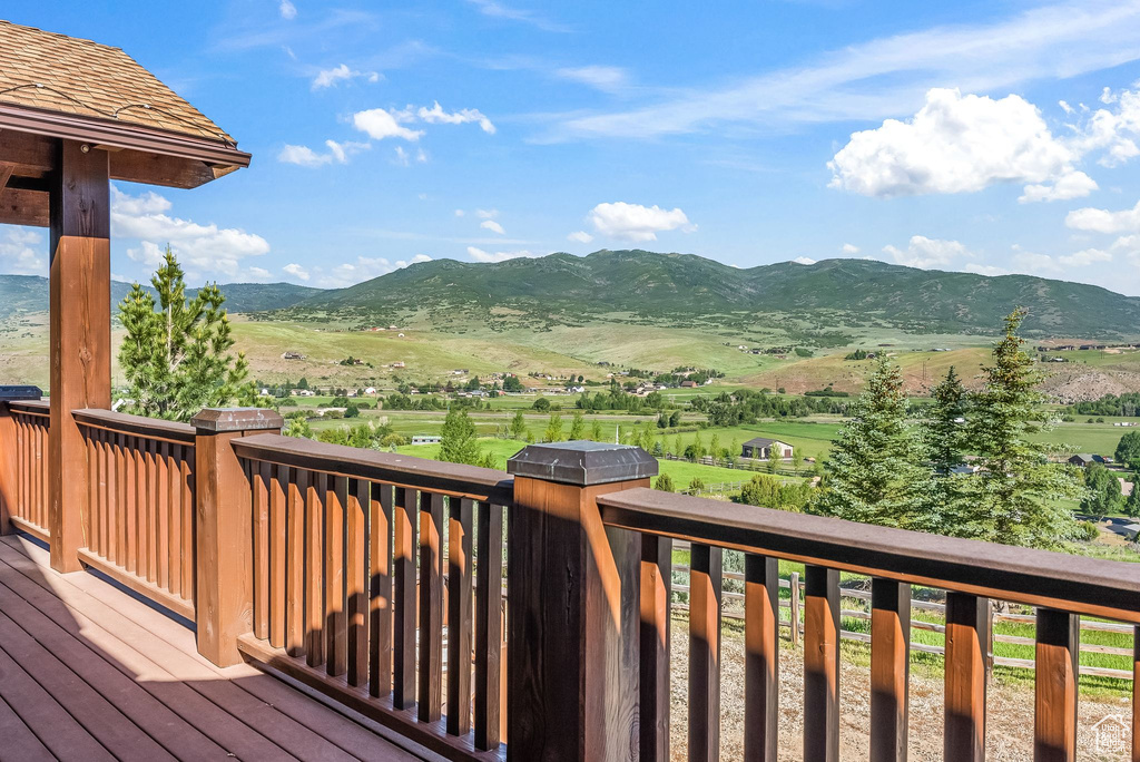 Wooden terrace with a mountain view and a rural view