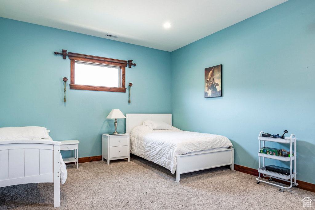 Bedroom featuring carpet floors