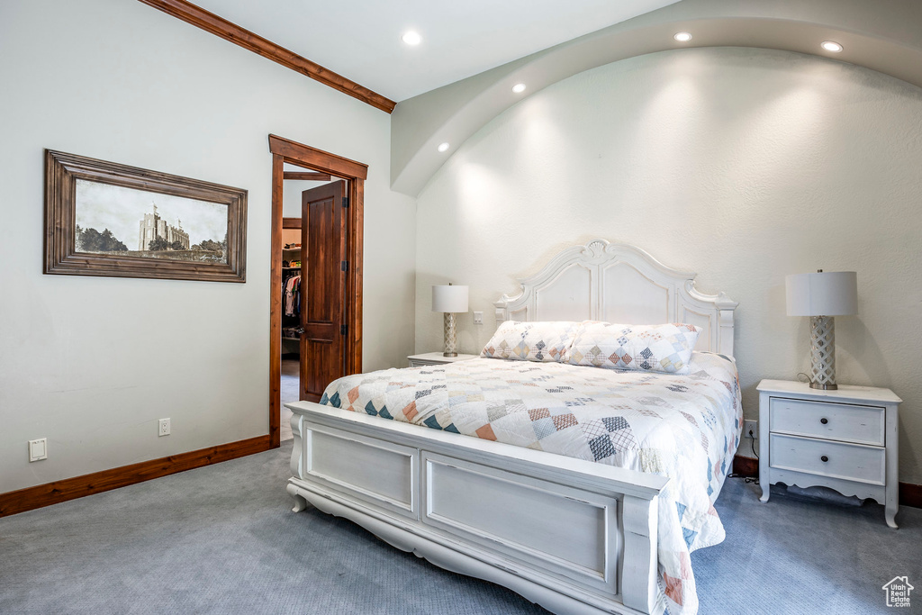 Bedroom with carpet flooring and crown molding