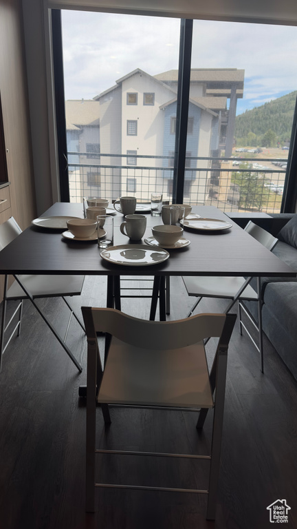 Dining area featuring hardwood / wood-style flooring