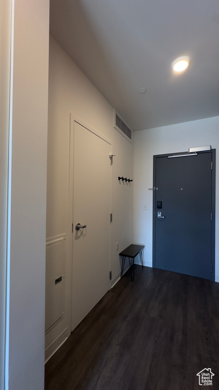 Interior space featuring dark hardwood / wood-style flooring