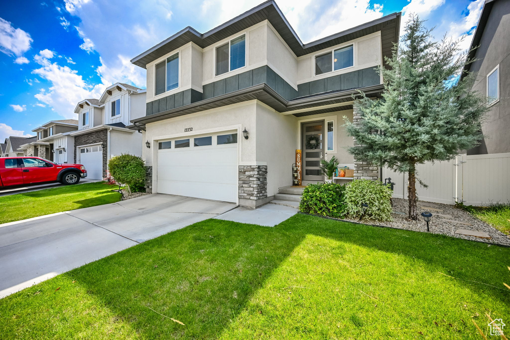 View of front of house with a garage