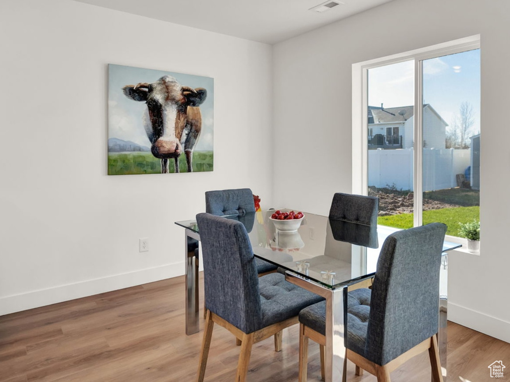 Dining area featuring light hardwood / wood-style floors