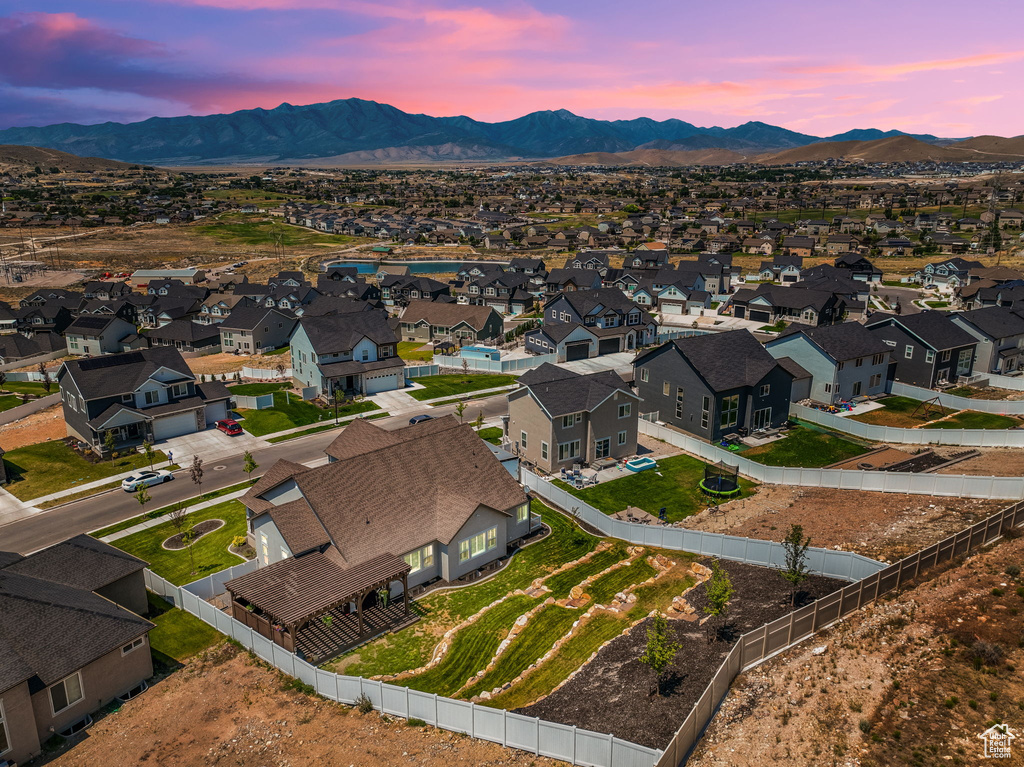 Aerial view at dusk with a mountain view