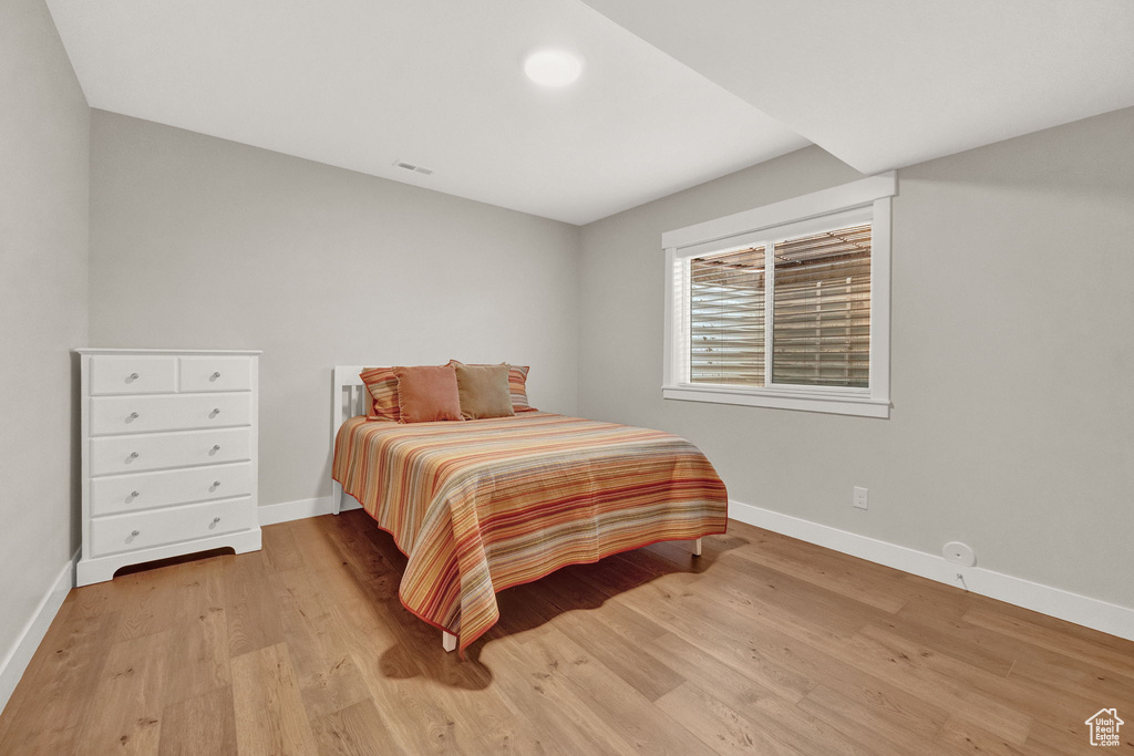 Bedroom featuring light wood-type flooring