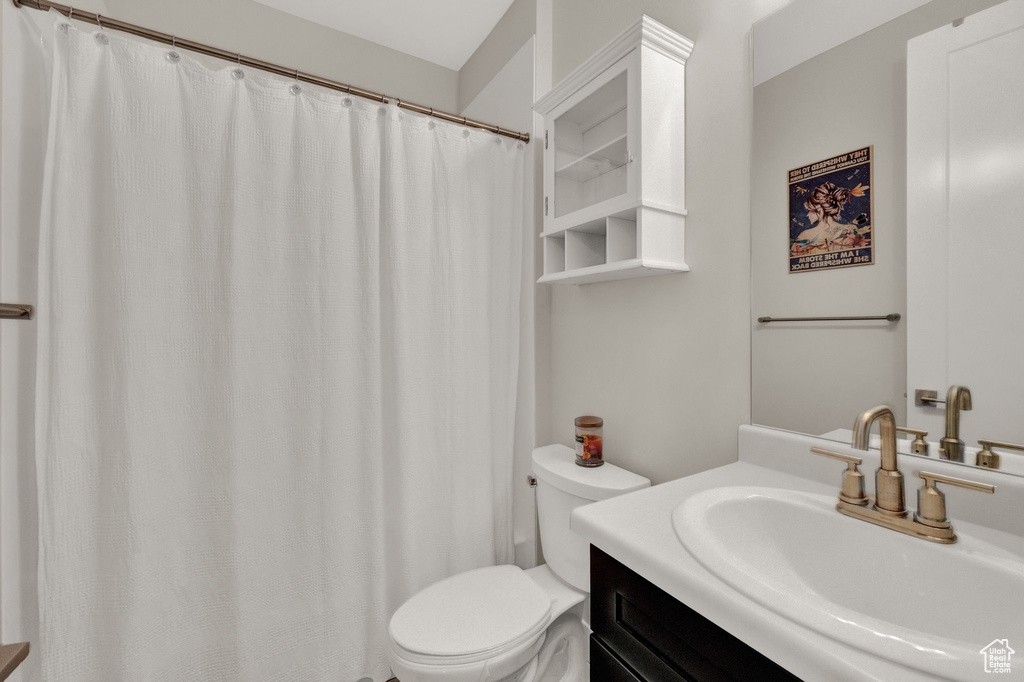 Bathroom with vanity and toilet