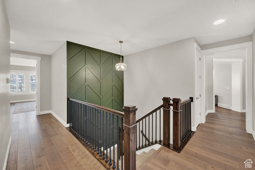 Hallway featuring wood-type flooring