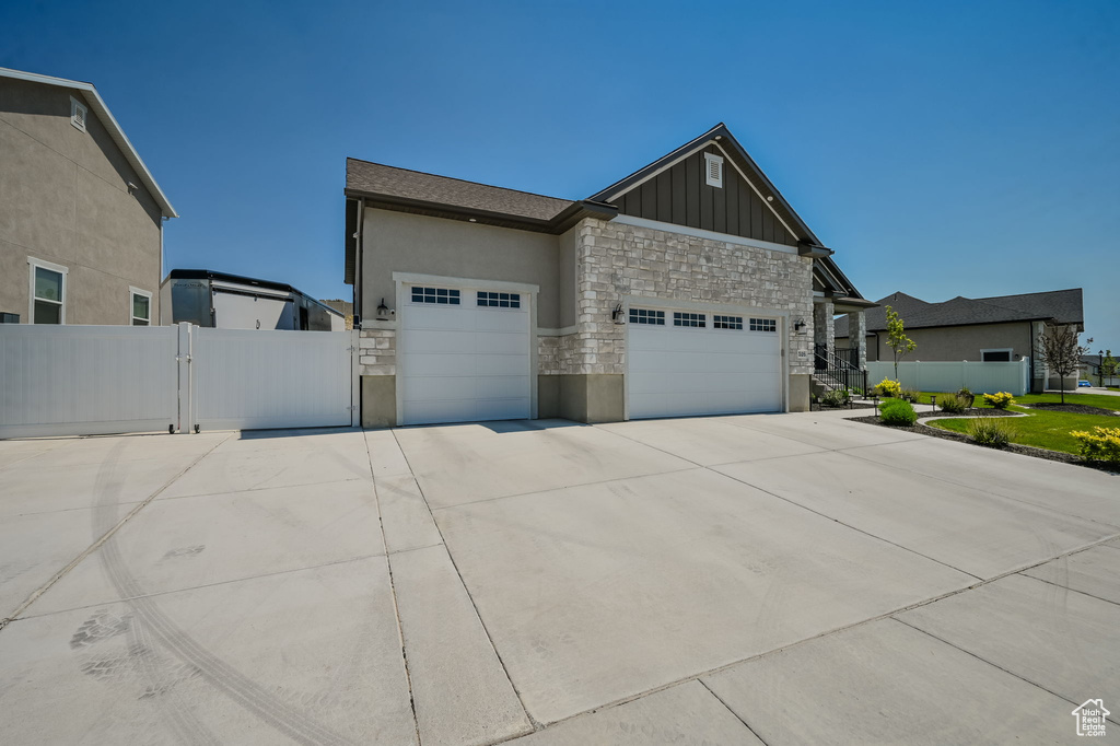 View of front of property featuring a garage