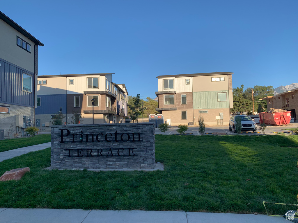 Community sign with a lawn