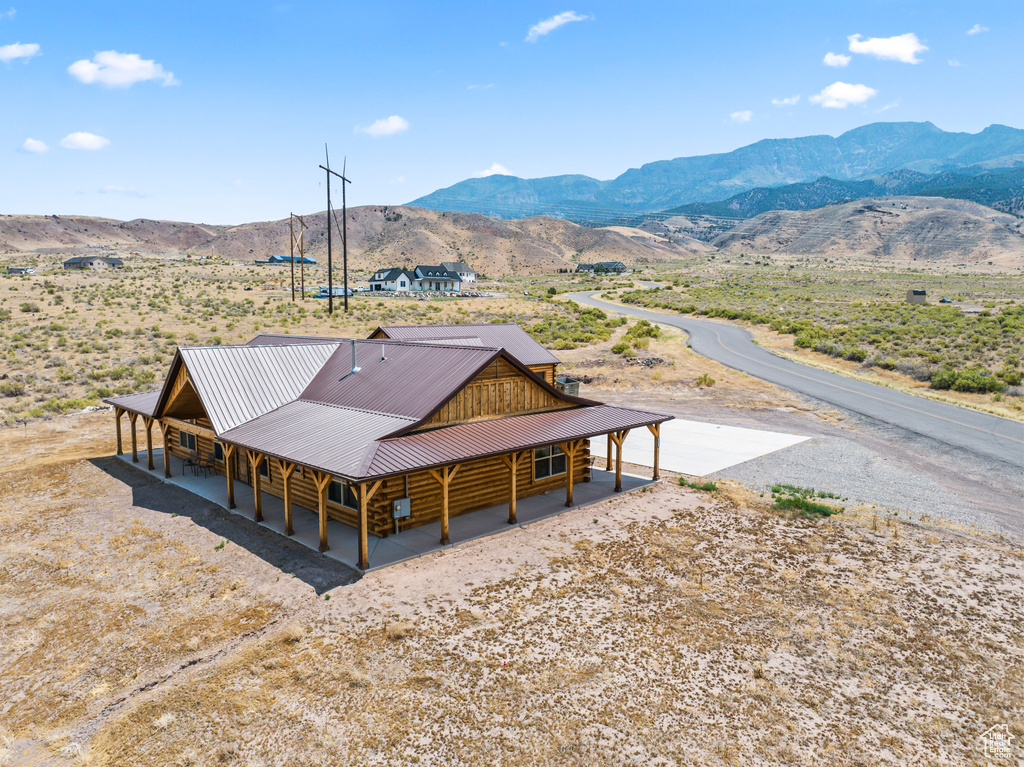 Exterior space featuring a mountain view