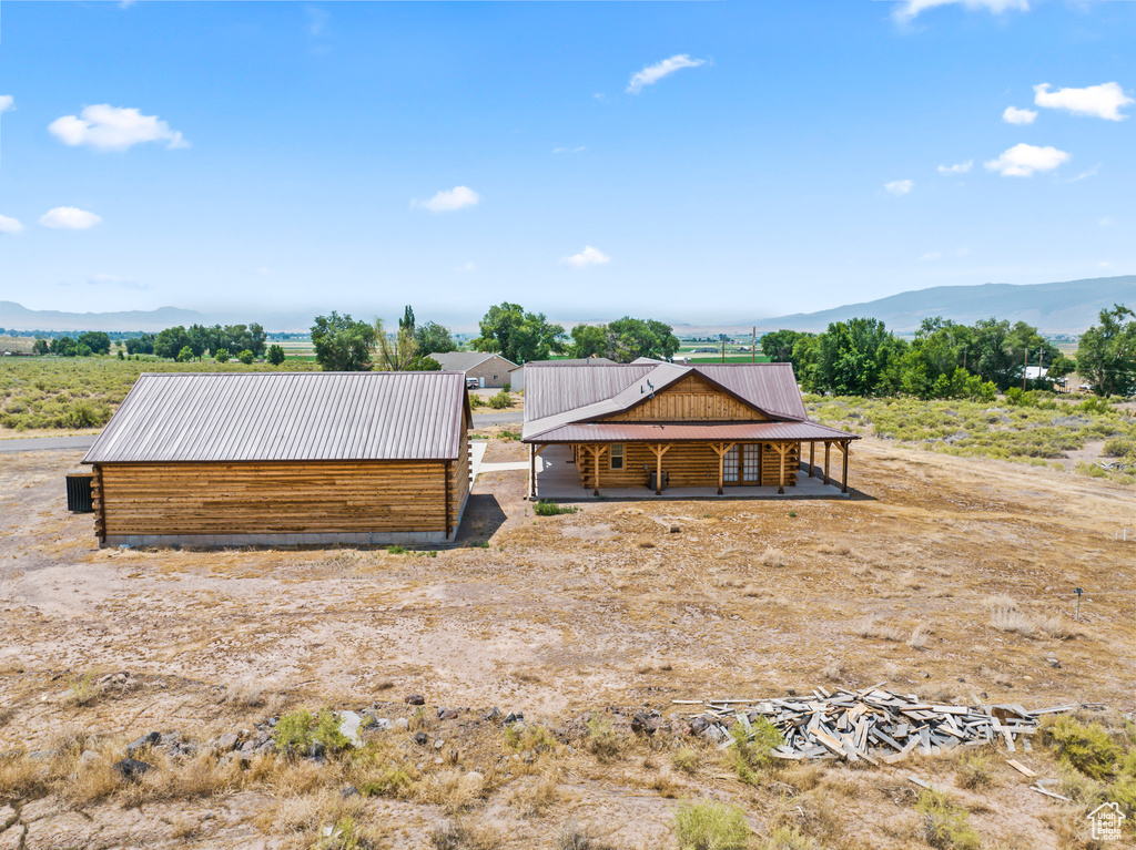 View of front of property with a mountain view